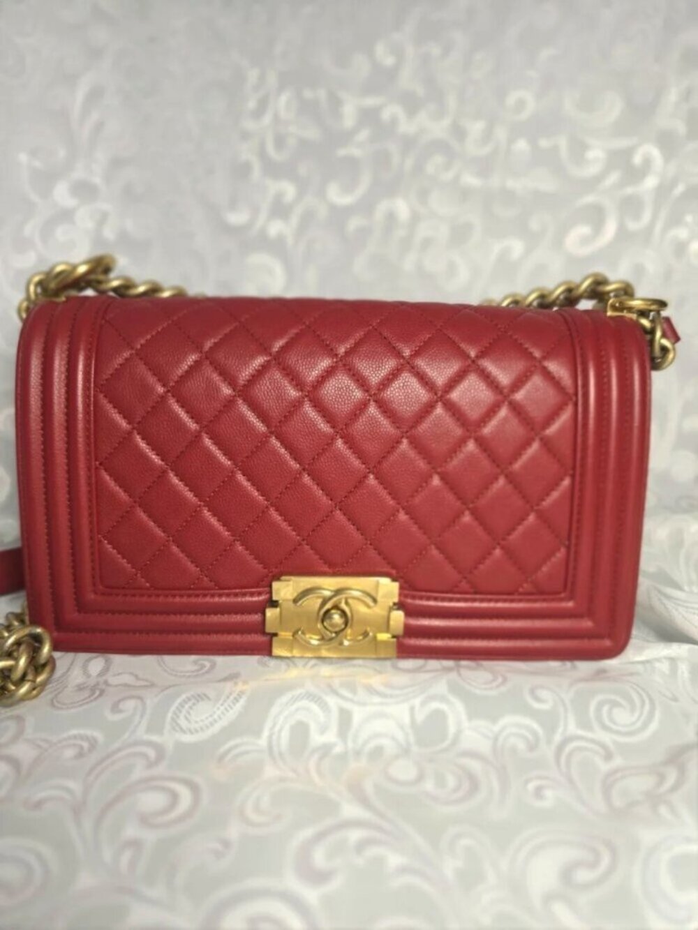 CHANEL Old Medium, Red Quilted Boy Bag with Iconic CC push-lock claps